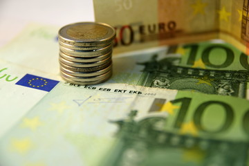 Close up of  Various currency notes and coins from different countries