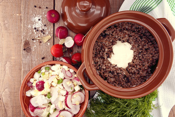 Buckwheat porridge with salad from radish and egg 