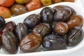 close-up black and green olives