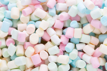 Background or texture of colorful mini marshmallows.