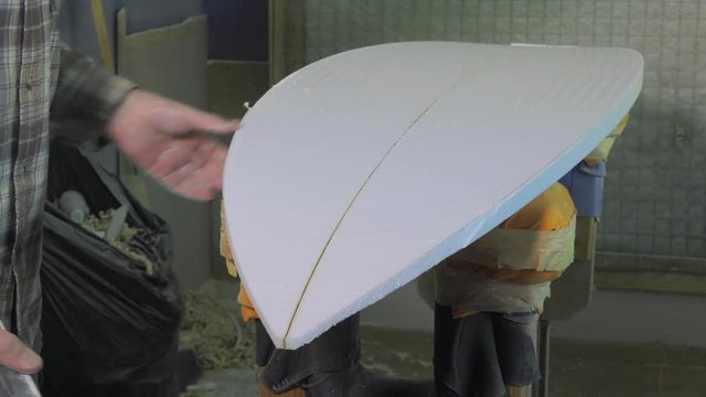 cutting and shaping the surfboard