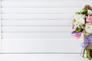 Beautifull spring bouquet on the shutters