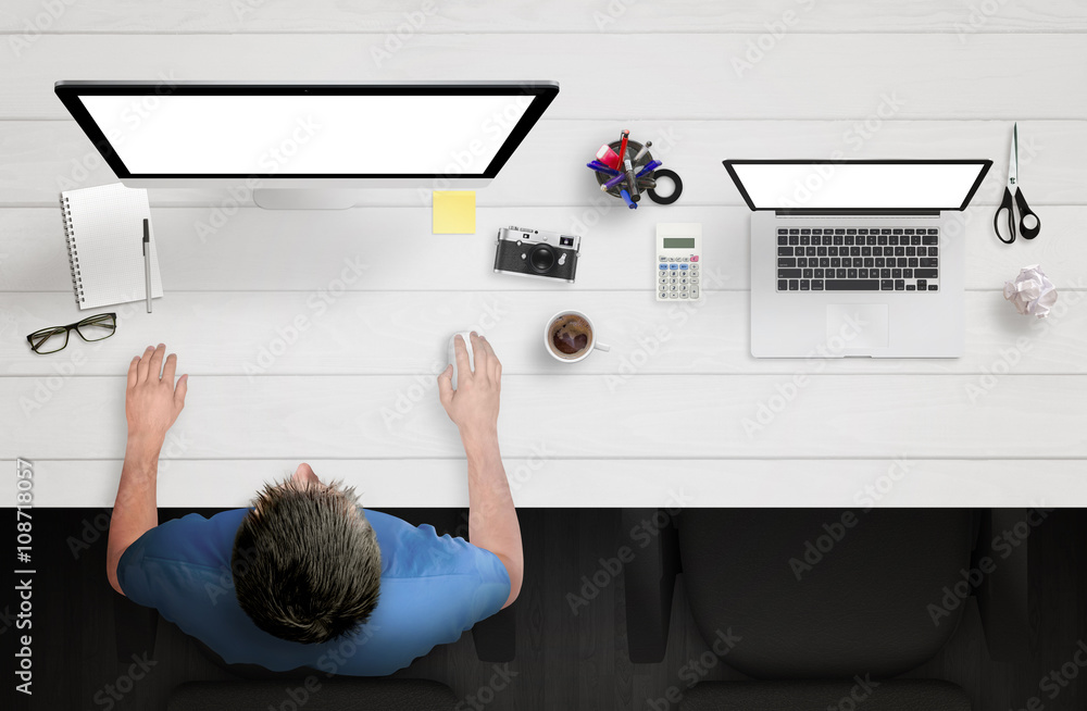 Poster man work on computer with white isolated screen. work desk with laptop, paper, camera, coffee, smart