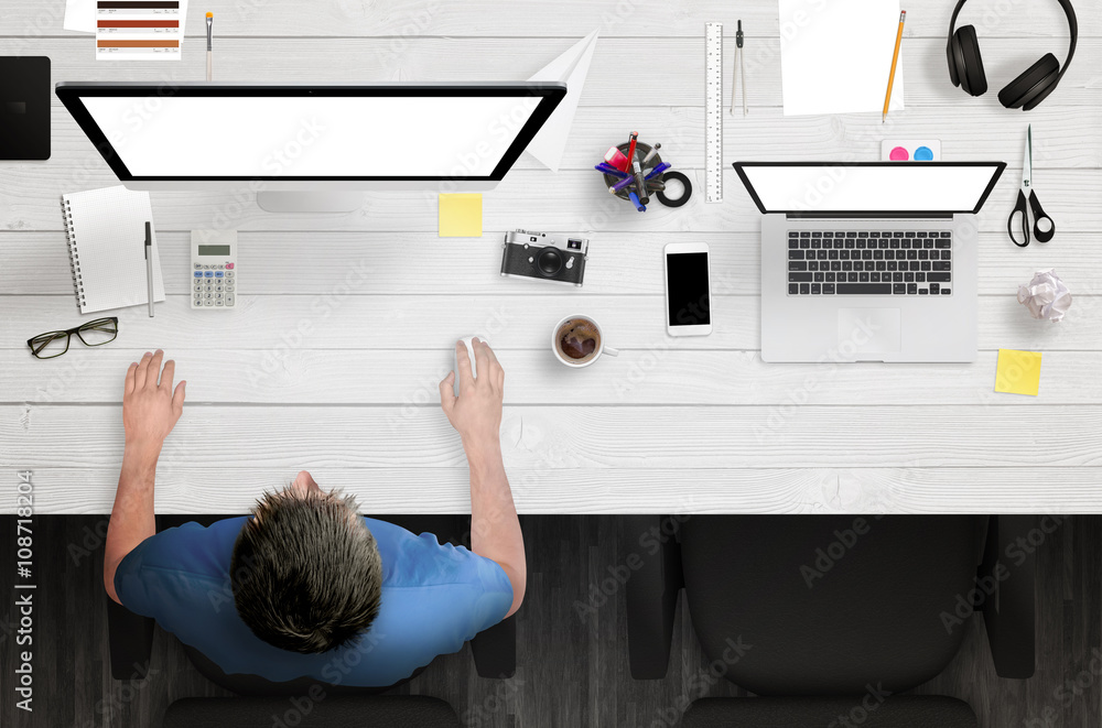 Poster man work on computer with white isolated screen. work desk with laptop, paper, camera, coffee, notep