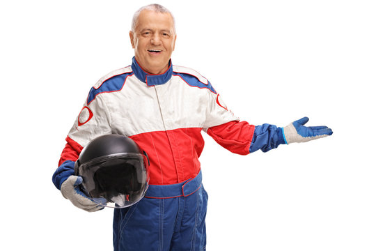 Mature car racer gesturing with his hand