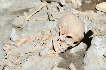 skull of long time ago dead man in the ruins of Ercolano Italy
