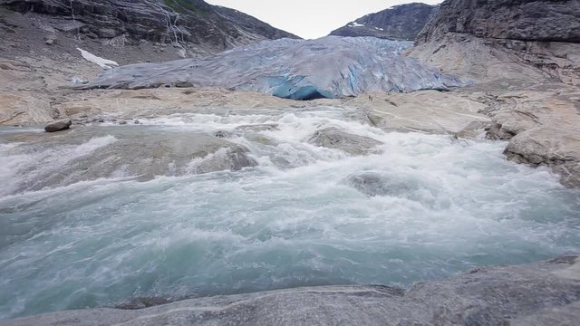 waterfall in Nigardsbreen glacier, Norway