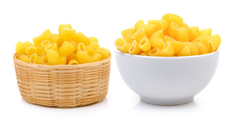 dry macaroni in the white bowl and basket on white background