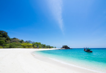 White sand and blue sea on the beach