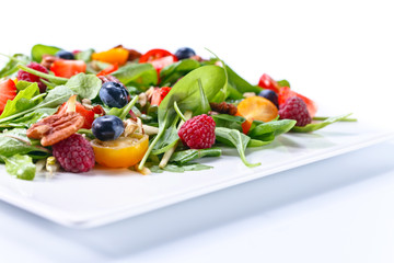 vegan salad with berries and nuts