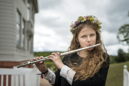 Girl playing transverse flute