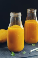Mango Lassi / Mango Smoothie in a glass jar