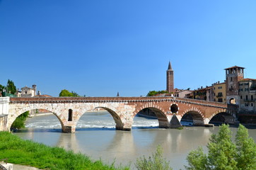 Fototapeta na wymiar Ponte Pietra on river Adige, ancient roman bridge in the old town of Verona, Italy 