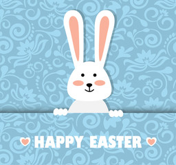 Paper blue background with a pattern and white cute easter bunny
