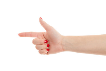 Woman hand with red manicure shows the direction . Isolated on w