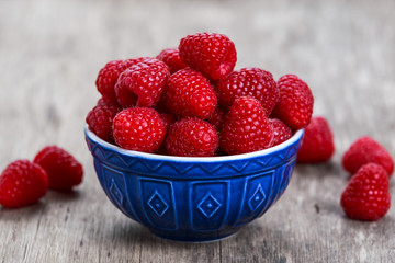 Fresh raspberries in bowl. concept for healthy eating.