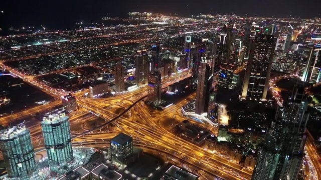 Dubai downtown at night, United Arab Emirates. View on Sheikh Zayed road from the 124th floor of Burj Khalifa skyscraper in Dubai, currently the tallest structure in the world, 829,8 m