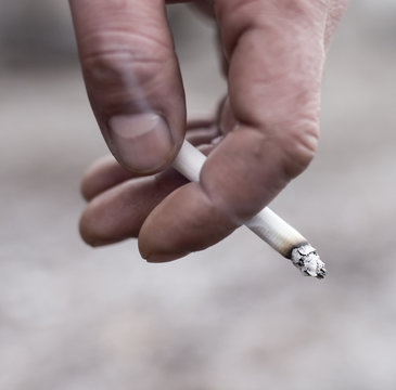 Cigarette in a man's hand
