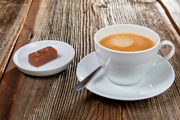 Chocolate bar on a brown wooden table