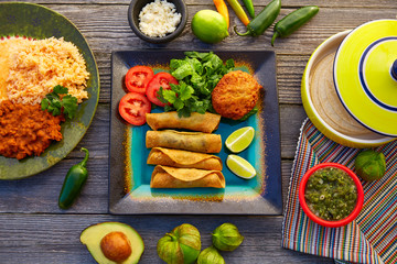 Mexican flautas rolled tacos with salsa