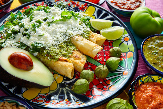 Green enchiladas Mexican food with guacamole