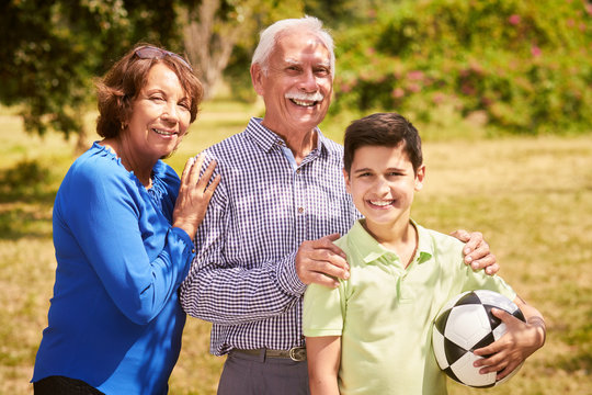 Portrait Happy Family Grandparents And Boy With Soccer Ball