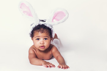 Cute baby girl portrait wearing bunny ears
