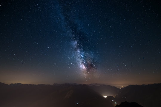 Glowing Milky Way and starry sky from the Alps