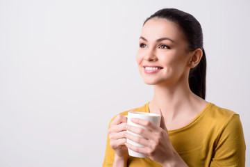 Positive content girl drinking tea