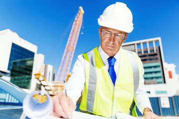 Engineer builder at construction site