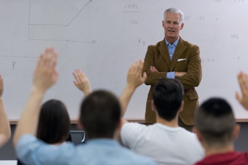 teacher with a group of students in classroom