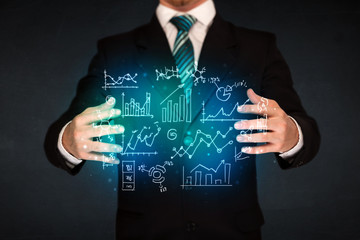 holding hand drawn business diagrams