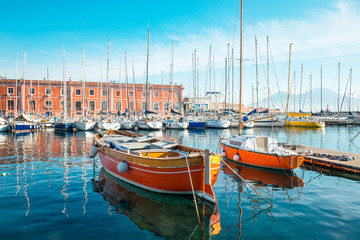 Street view of Naples harbor with boats, italy Europe - obrazy, fototapety, plakaty