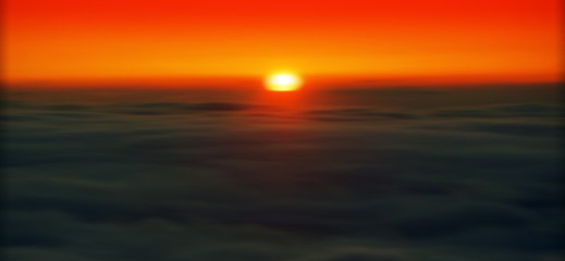 Fototapeta na wymiar Horizontal vivid blurred sunset with clouds background