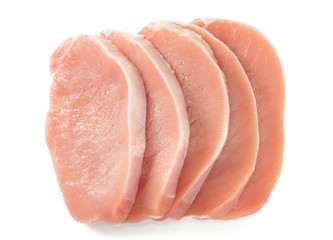 raw pork pieces isolated on white background