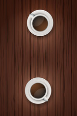 Two cups of coffee on wooden table