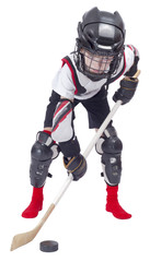 Fototapeta premium Young hockey player at ammunition