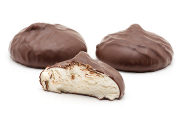 chocolate covered marshmallows on white background