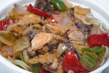 Chinese noodles with a chicken and vegetables