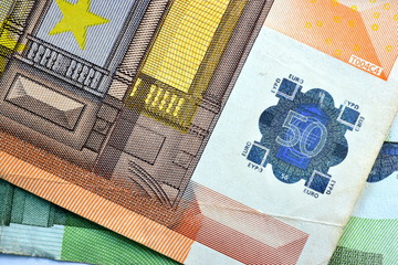 Close up Euro and US Dollar 100 and 50 notes (bill)
