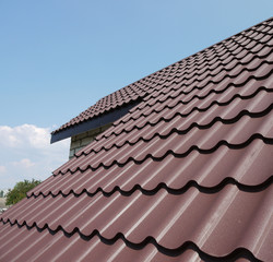 Fototapeta na wymiar the roof is made of metal tiles