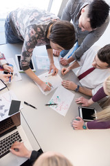 young business people group on meeting at modern office
