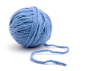 Ball of yarn on white background