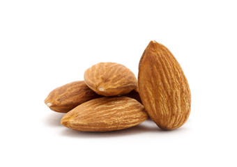 group of almonds isolated on white