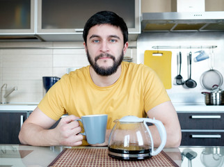 Bearded man in the kitchen