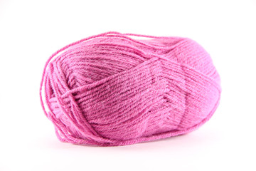 Oval ball of pink yarn white background