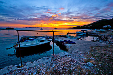 Idyllic sunset in old fishermen harbor