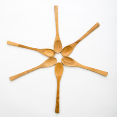wooden spoons on white table