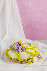 Fototapeta na wymiar Colorful butter cream flowers cake