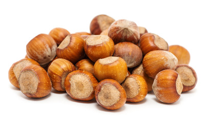 Hazelnuts on white background